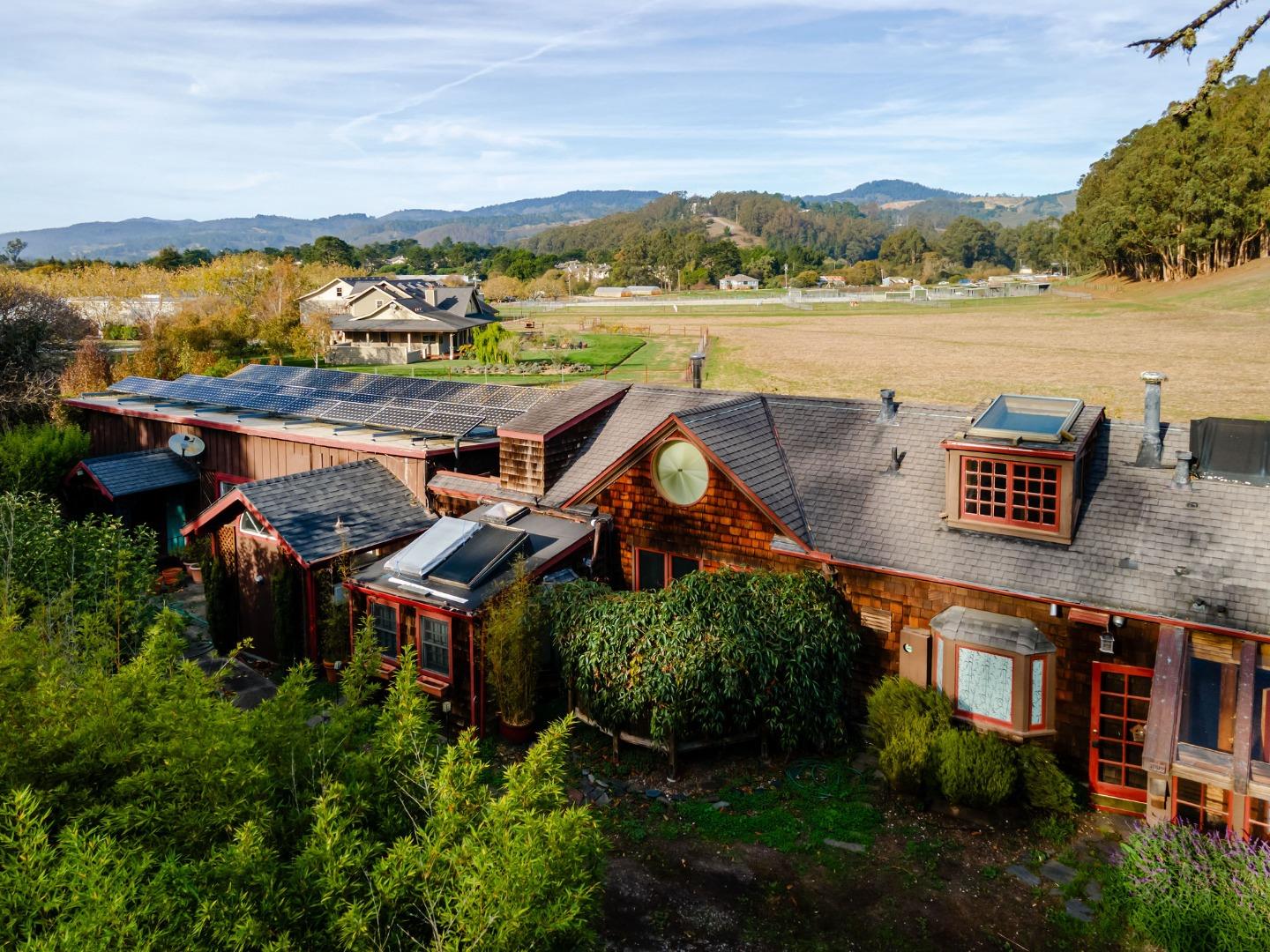 1009 Miramontes Street Half Moon Bay, CA 94019 - Photo 5 of 69 an aerial view of a house with a lake view
