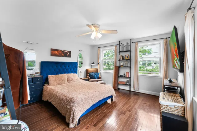 a bedroom with a bed furniture and a window