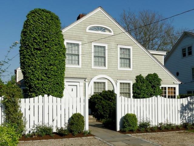 16 Roosevelt Road Westport, CT 06880 - Photo 1 of 1 a front view of a house with a garden