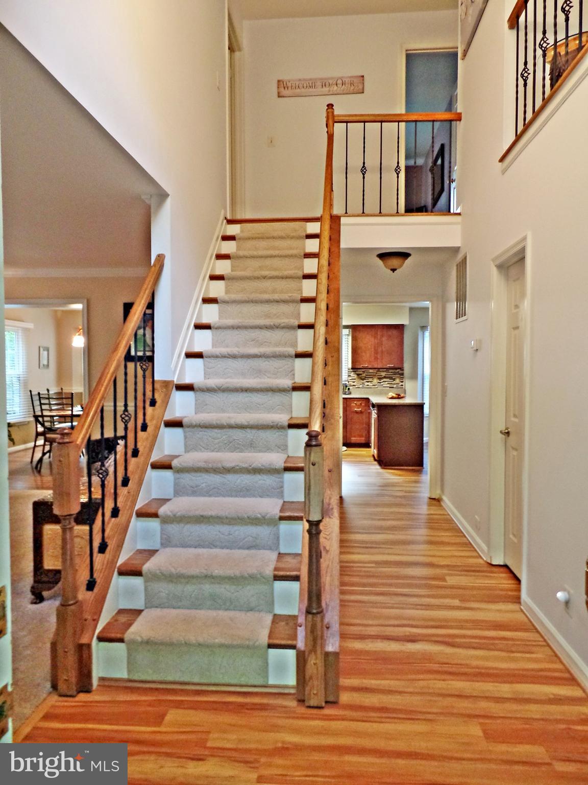 Hardwood Stairs with New Rod Iron Balusters