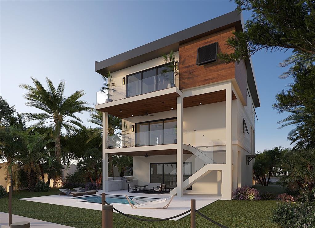 14184 West Parsley Drive Madeira Beach, FL 33708 - Photo 2 of 3 a view of a building with a yard