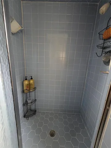 a view of a room with racks on the wall