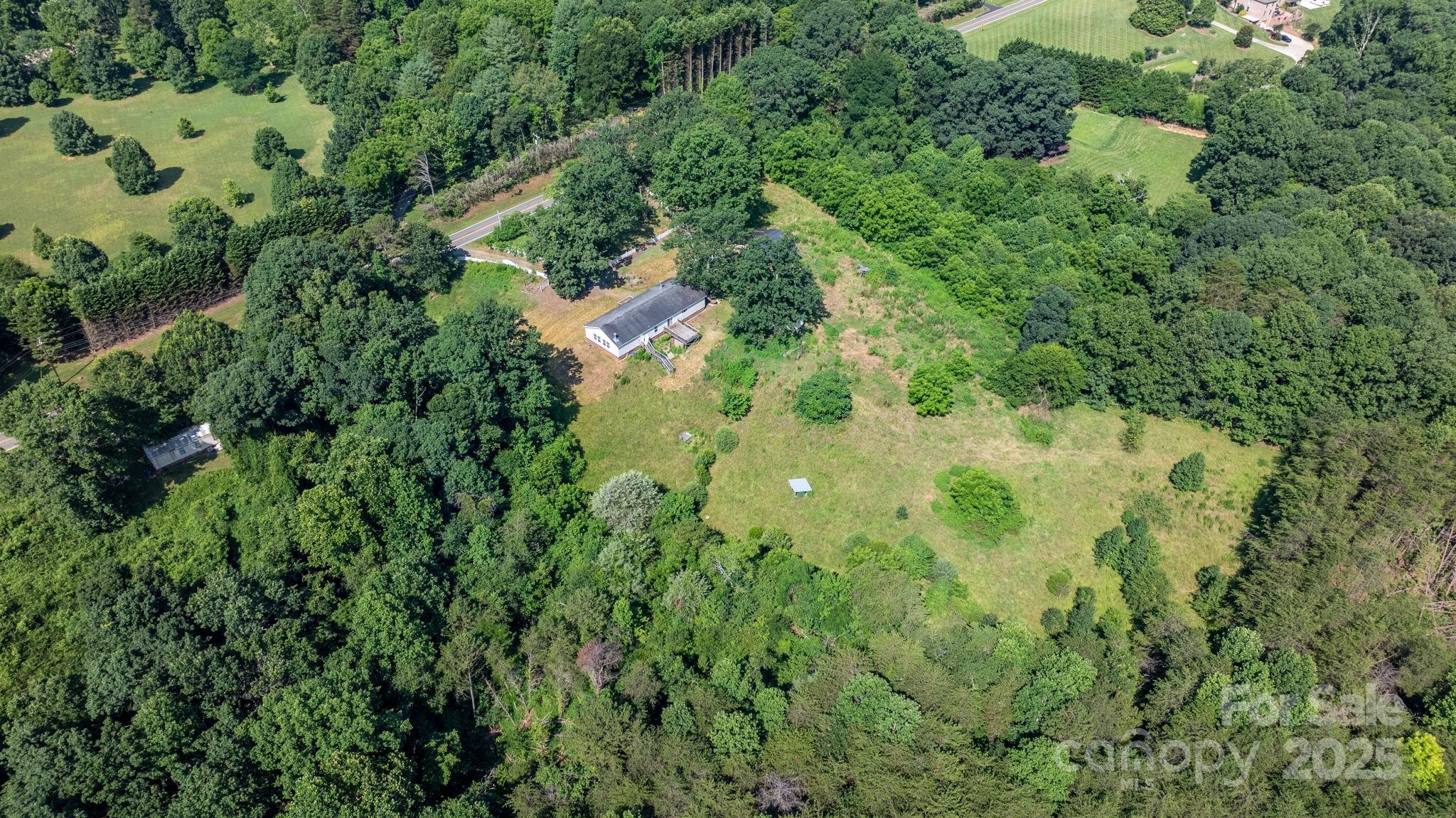 6314 Providence Church Road Vale, NC 28168 - Photo 12 of 39 an aerial view of residential house with outdoor space and trees all around