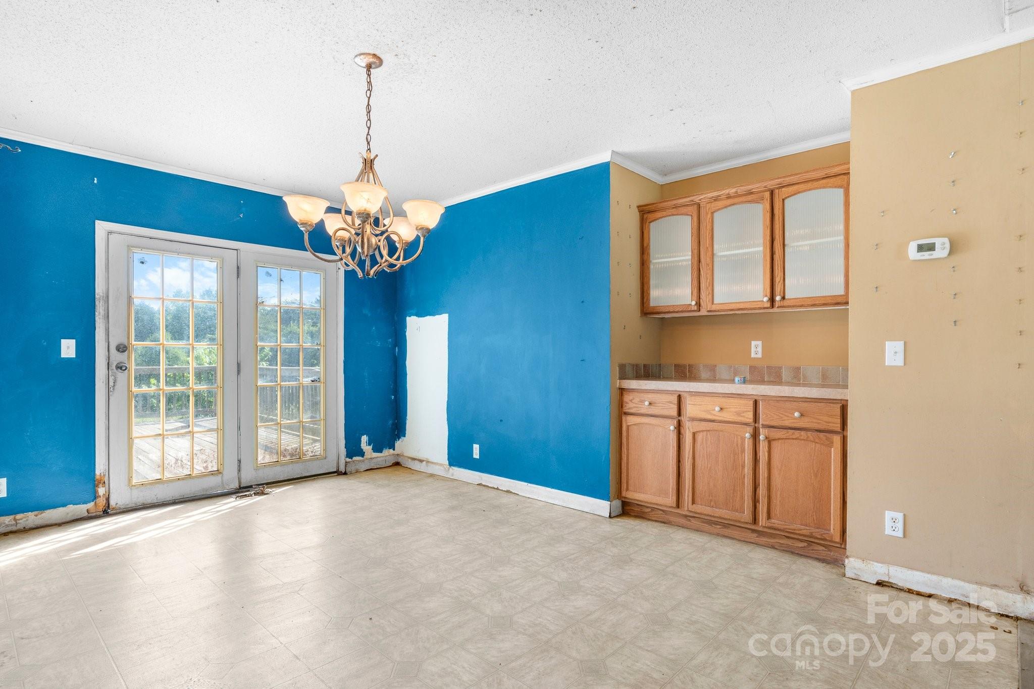 6314 Providence Church Road Vale, NC 28168 - Photo 18 of 39 a furnished livingroom with windows and chandelier