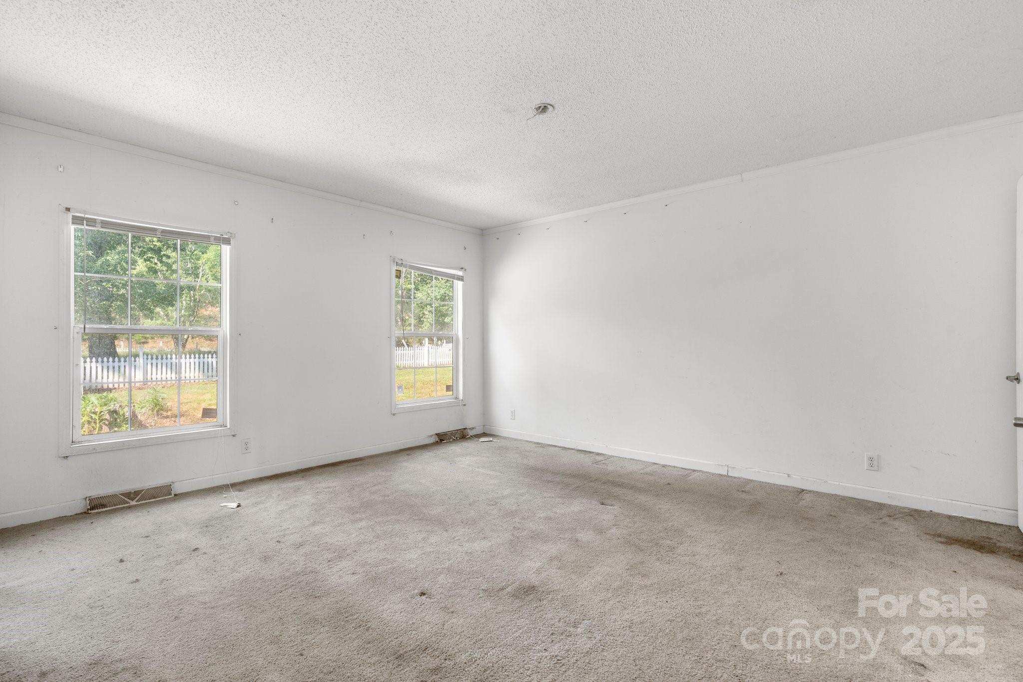 6314 Providence Church Road Vale, NC 28168 - Photo 22 of 39 an empty room with windows