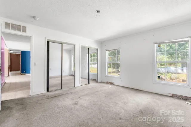 a bathroom with a sink double vanity and a mirror