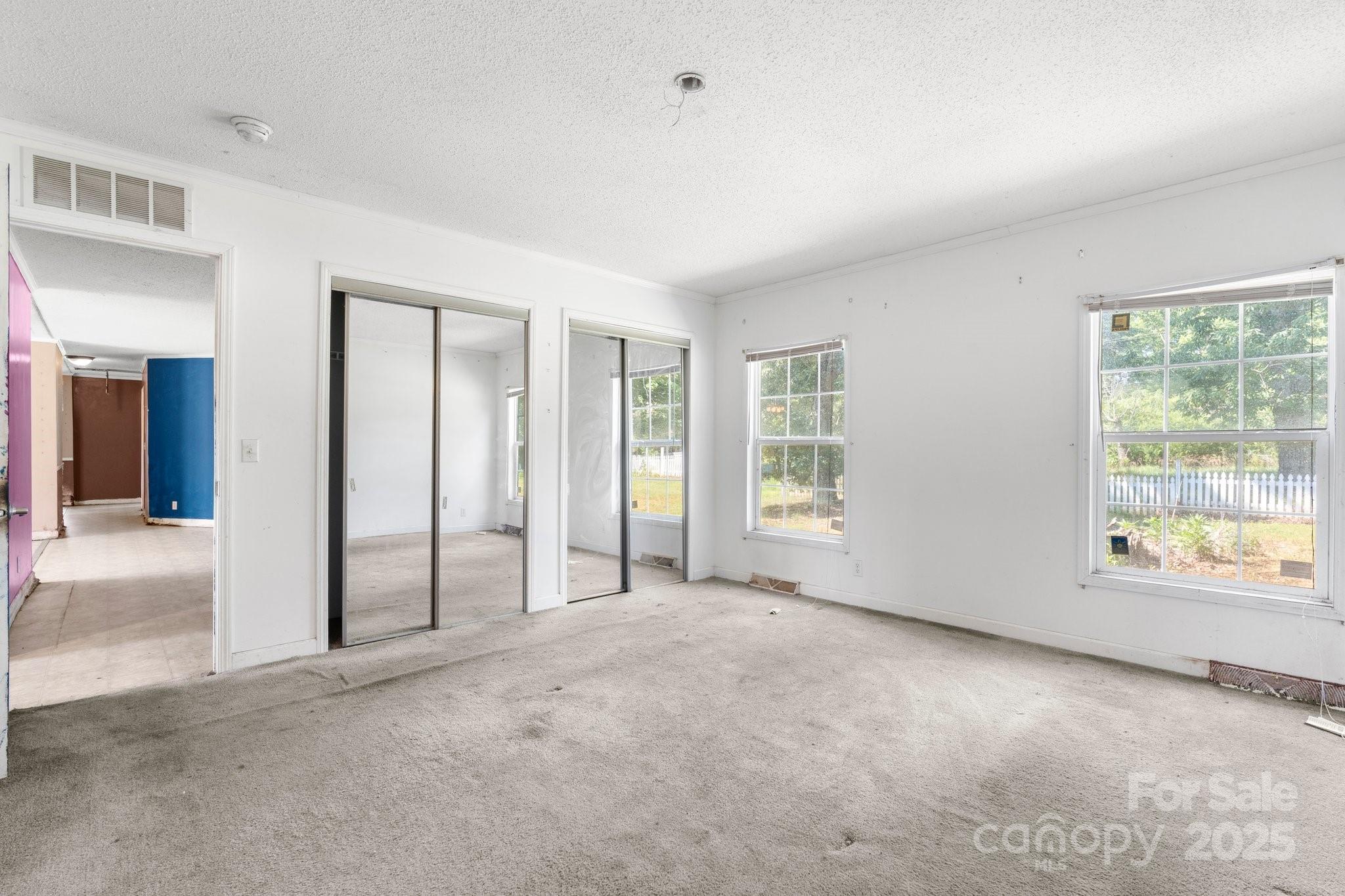 6314 Providence Church Road Vale, NC 28168 - Photo 23 of 39 an empty room with windows and closet