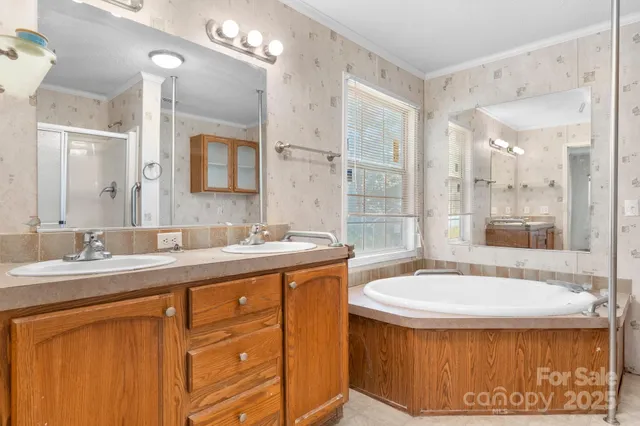 a bathroom with a toilet a sink and a window