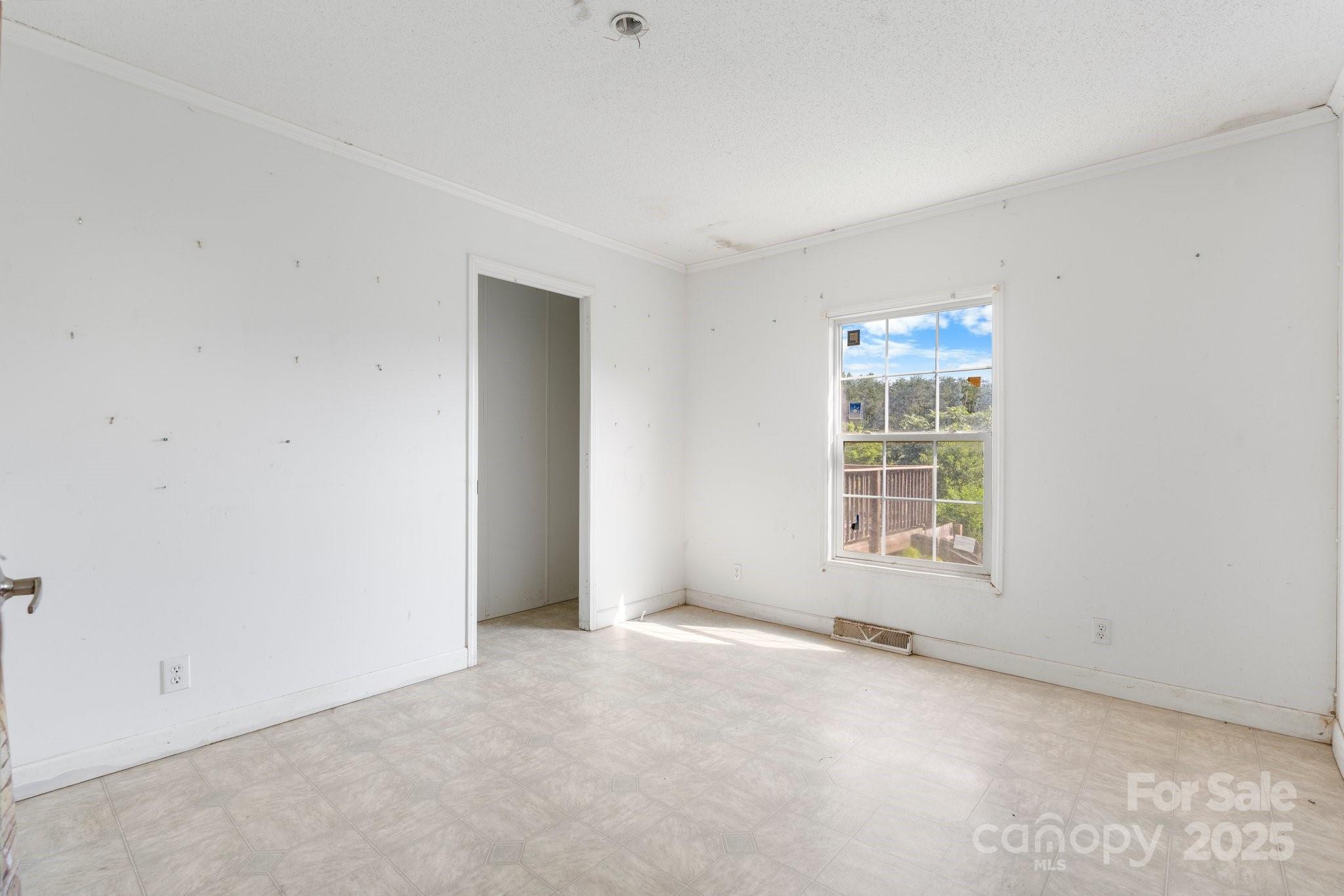 6314 Providence Church Road Vale, NC 28168 - Photo 27 of 39 an empty room with a window