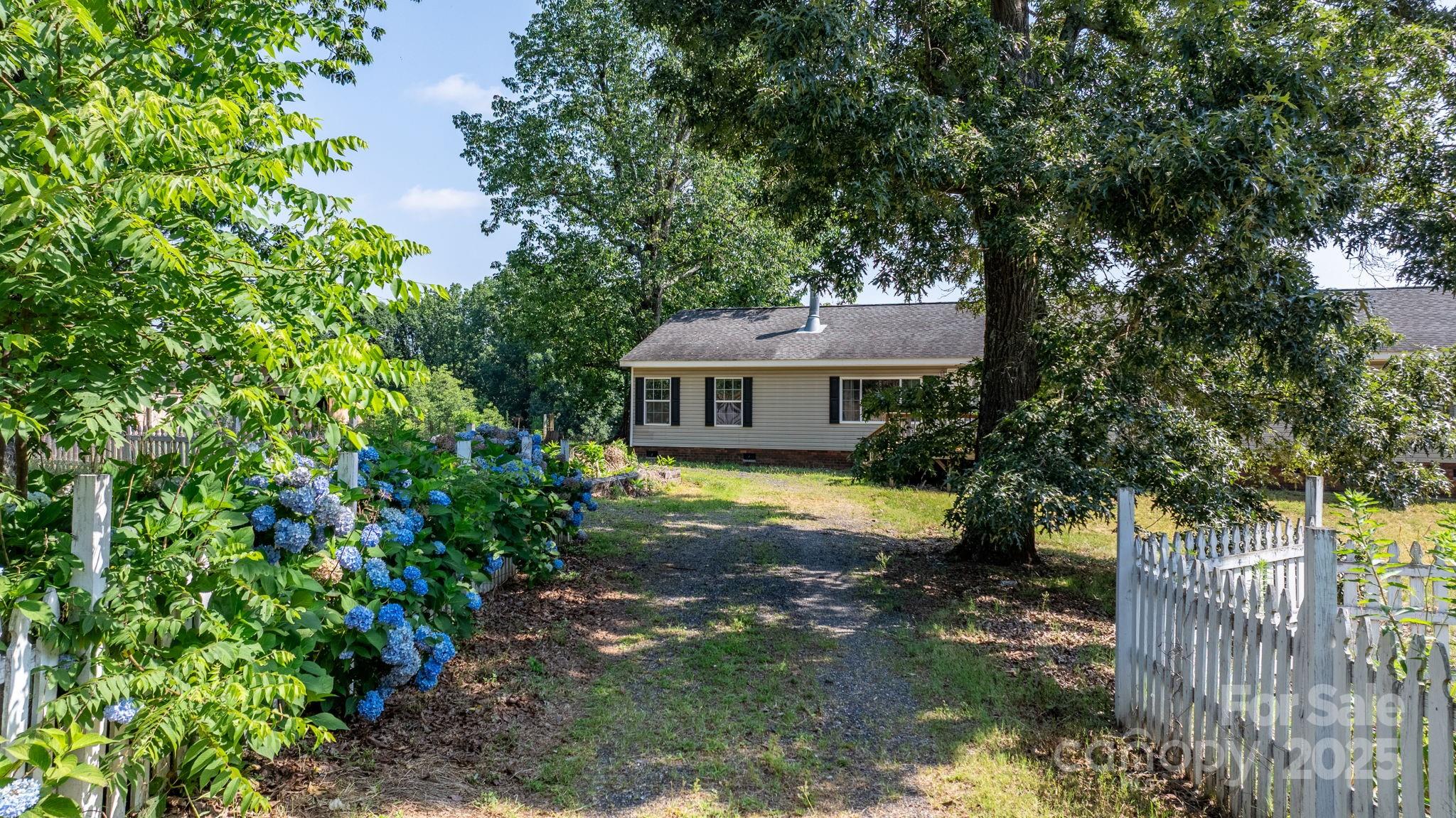 6314 Providence Church Road Vale, NC 28168 - Photo 38 of 39 a view of house with a yard