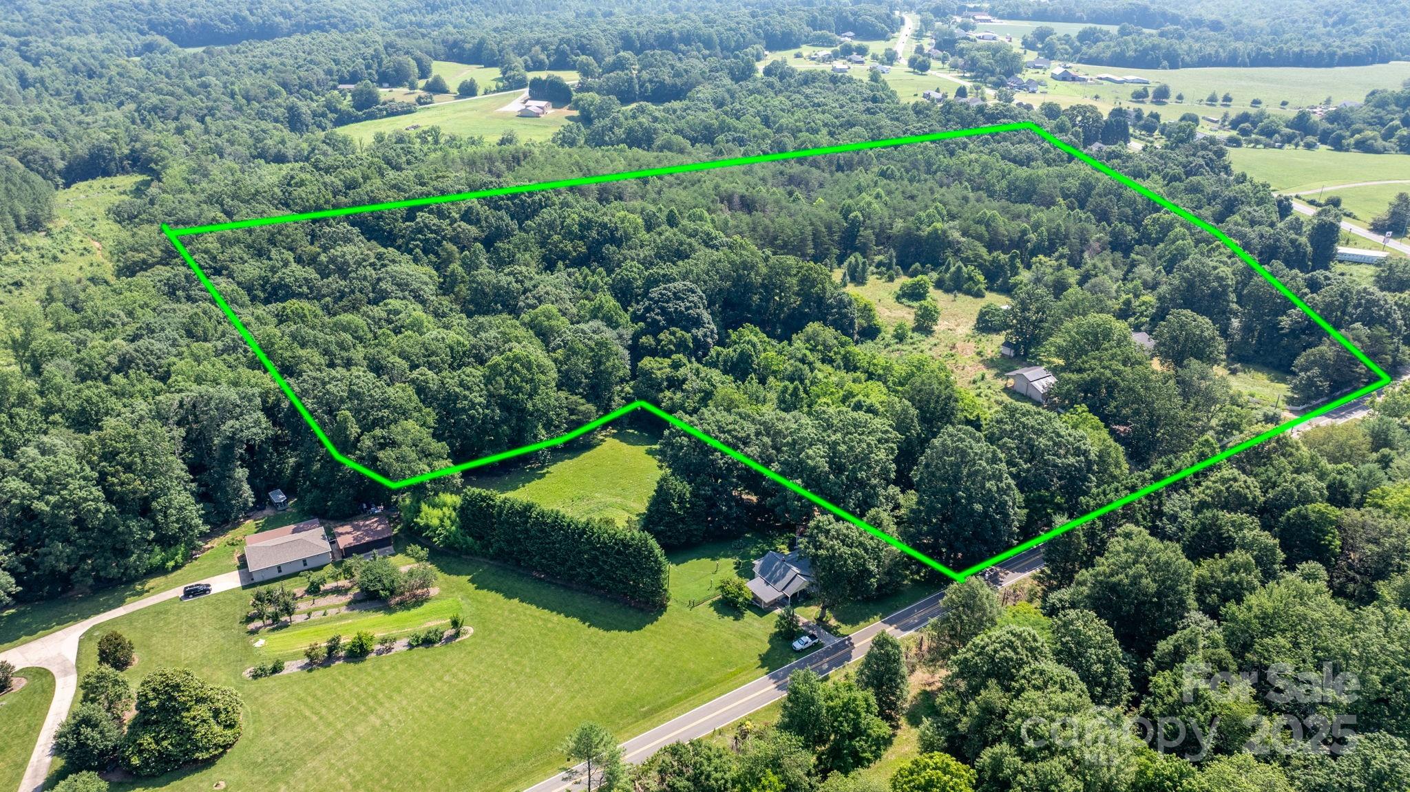 6314 Providence Church Road Vale, NC 28168 - Photo 5 of 39 an aerial view of a house with a yard and outdoor seating