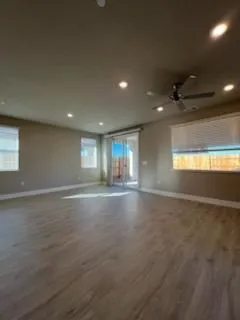 a view of empty room with windows