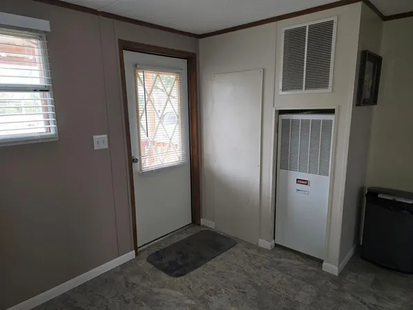 a view of balcony with furniture