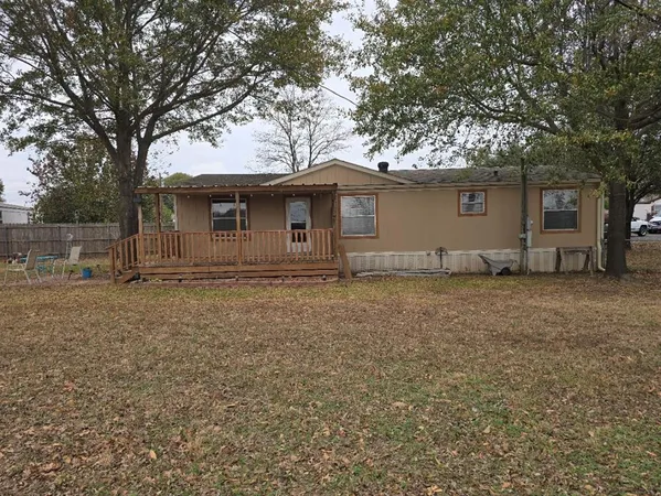 two house with trees in front of it