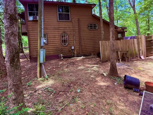 a backyard of a house with seating space