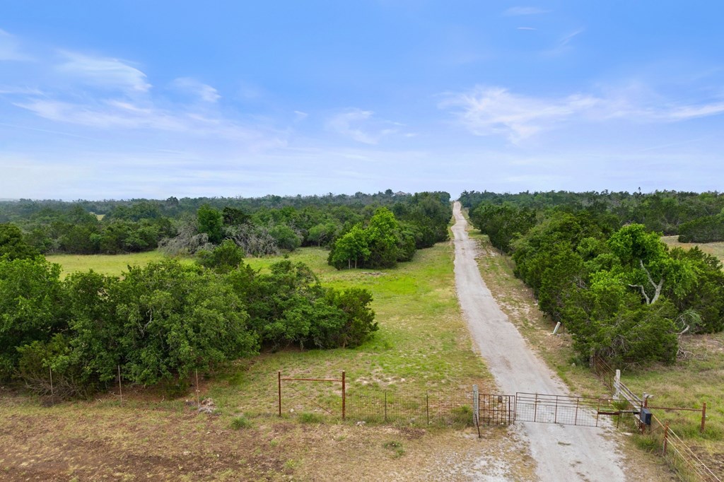 5 Mary Lane, Unit 5 Harper, TX 78631 - Photo 29 of 30 a view of a pathway both side of grassy field with shrub
