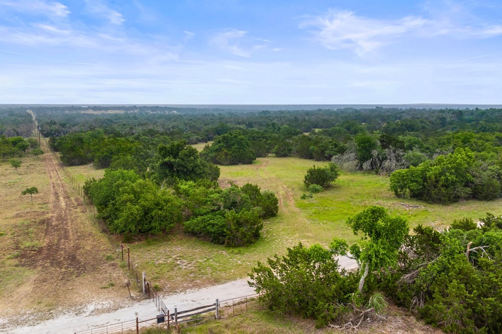 5 Mary Lane, Unit 5 Harper, TX 78631 - Photo 30 of 30 a view of a lake with houses in the back
