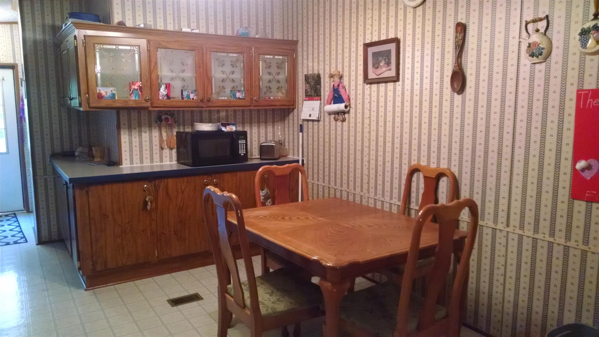 8647 Richards Road Lyles, TN 37098 - Photo 20 of 29 a view of a dining room with furniture and window