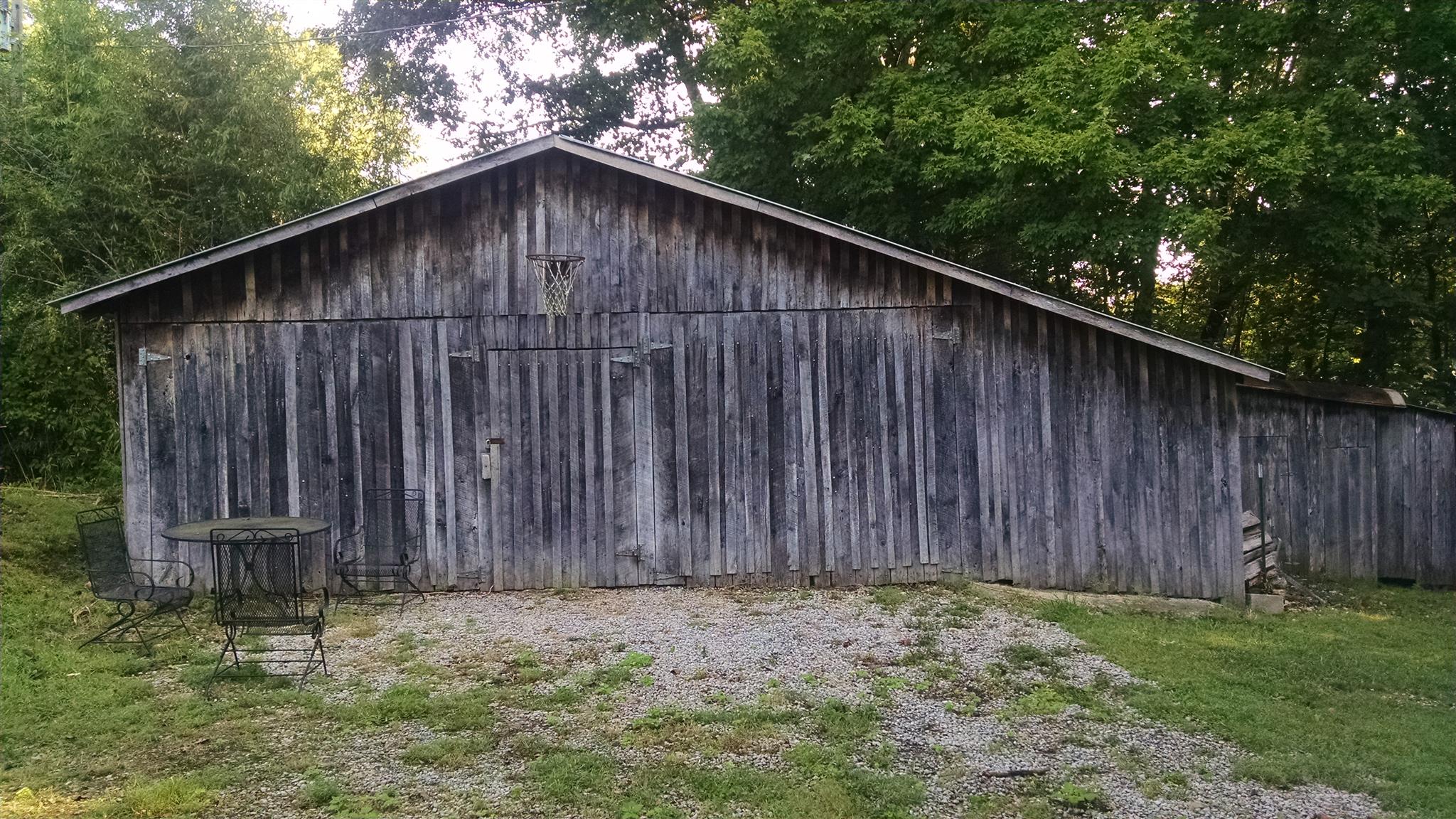 8647 Richards Road Lyles, TN 37098 - Photo 5 of 29 a wooden fence with a small yard