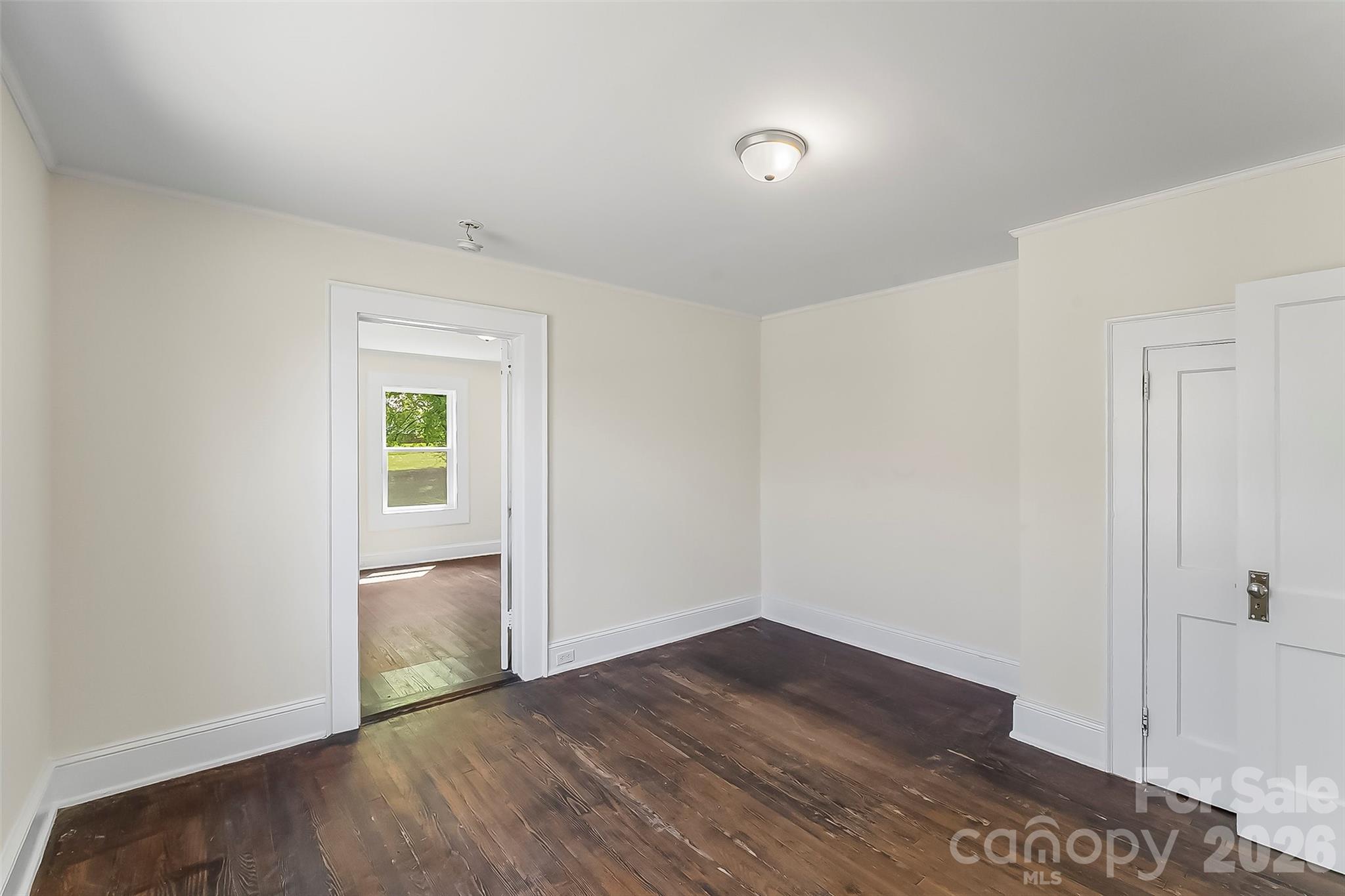 608 East Concord Street Morganton, NC 28655 - Photo 15 of 23 an empty room with wooden floor and closet