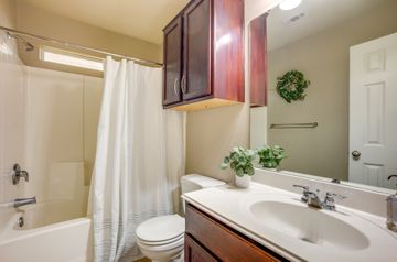 2105 Granite Ridge Place Bryan, TX 77801 - Photo 19 of 23 a bathroom with a sink toilet and shower