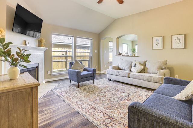 2105 Granite Ridge Place Bryan, TX 77801 - Photo 7 of 23 a living room with furniture and a flat screen tv