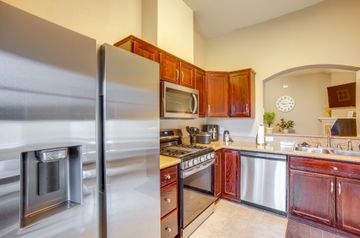 2105 Granite Ridge Place Bryan, TX 77801 - Photo 9 of 23 a kitchen with stainless steel appliances granite countertop a sink and cabinets