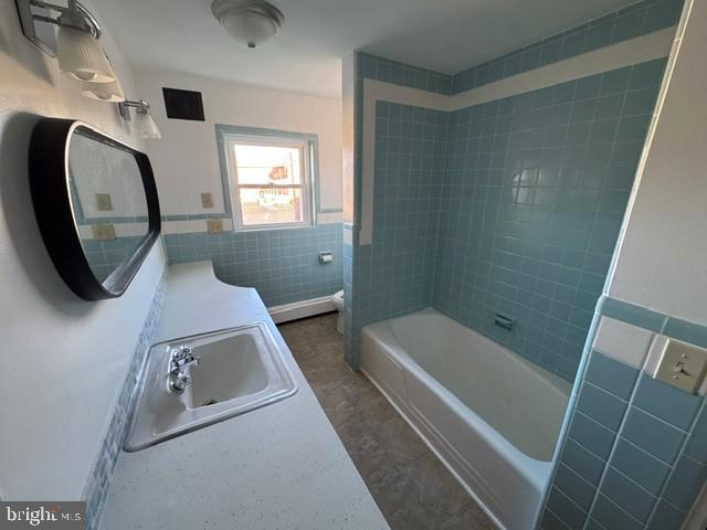 859 Main Street Pennsburg, PA 18073 - Photo 3 of 14 Charming retro bathroom with blue tiles.