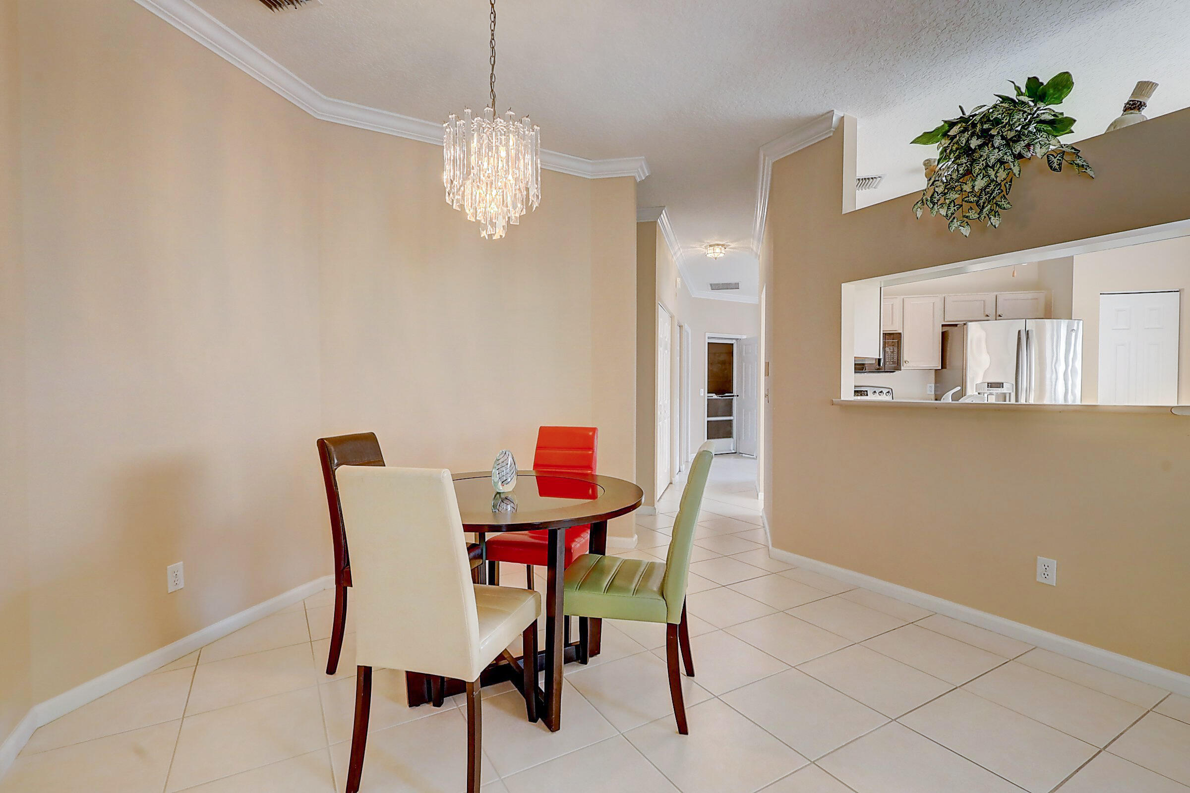6788 Southeast Warwick Lane Stuart, FL 34997 - Photo 7 of 40 Dining Room overlooking Kitchen