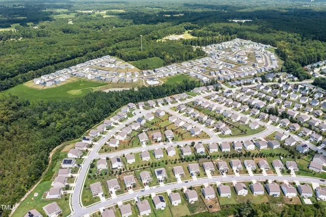 a view of swimming pool from a yard