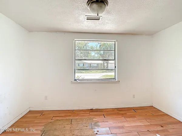 an empty room with windows