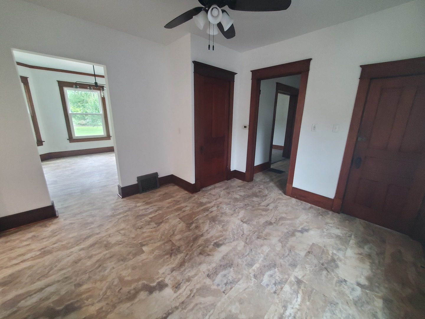 712 3rd Street Moline, IL 61265 - Photo 16 of 29 a view of a livingroom with a ceiling fan