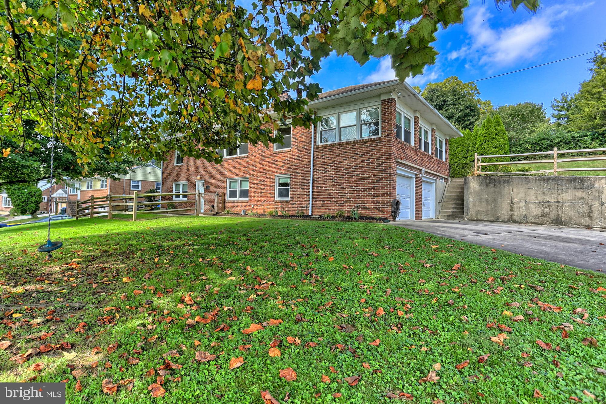 425 Corbin Road York, PA 17403 - Photo 2 of 49 a view of a house with a yard and sitting area