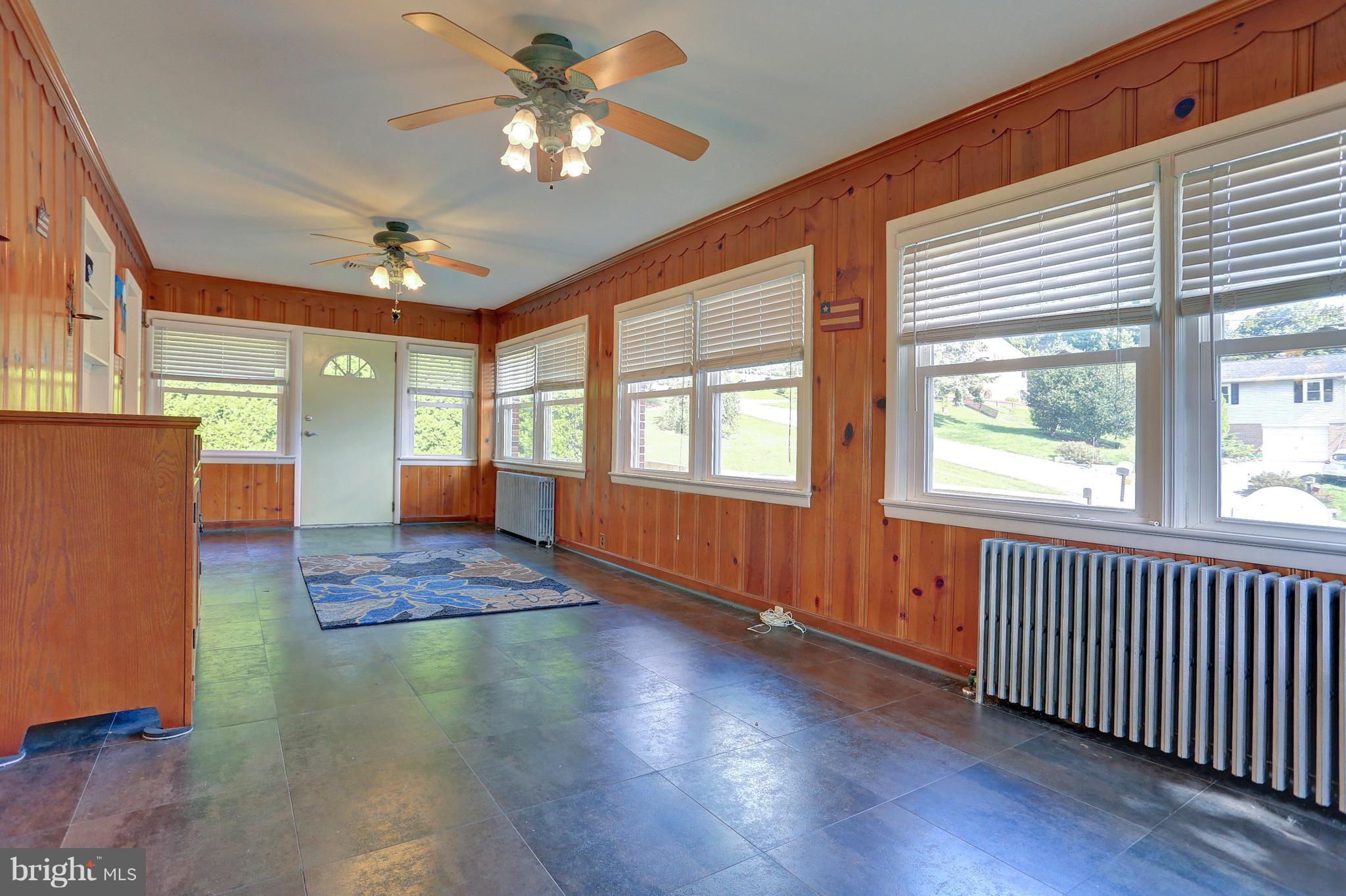 425 Corbin Road York, PA 17403 - Photo 17 of 49 a view of an empty room with window chandelier