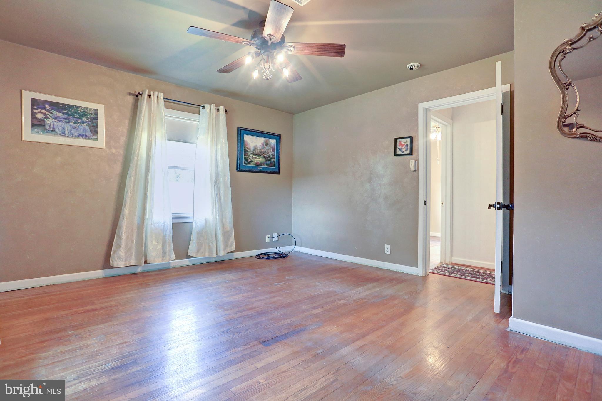 425 Corbin Road York, PA 17403 - Photo 20 of 49 a view of an empty room with wooden floor