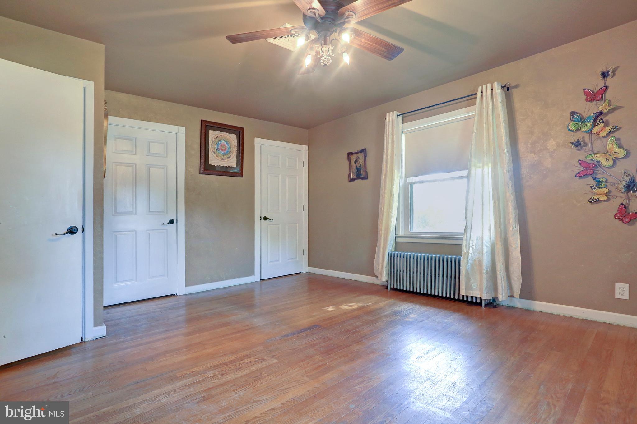425 Corbin Road York, PA 17403 - Photo 21 of 49 an empty room with wooden floor closet and windows