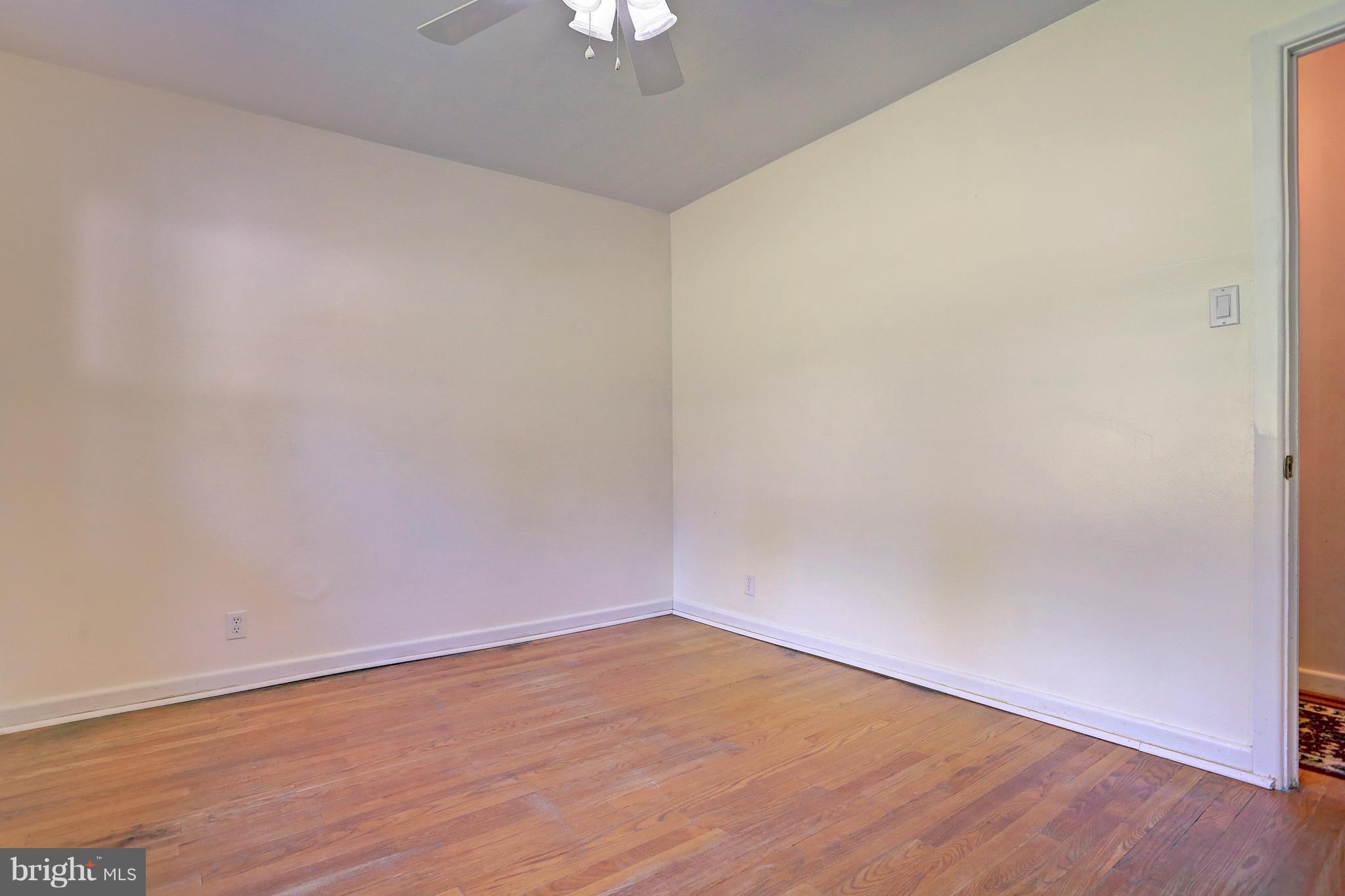 425 Corbin Road York, PA 17403 - Photo 28 of 49 a view of an empty room with wooden floor