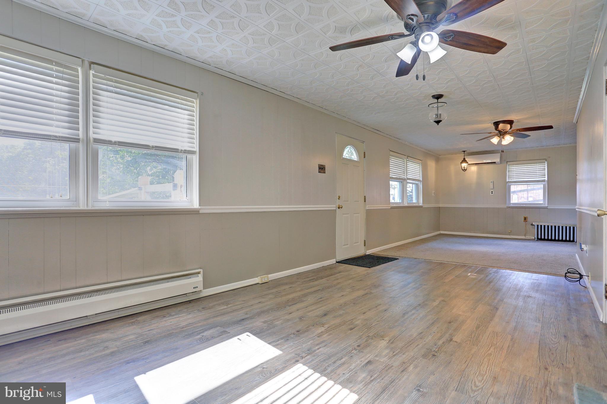 425 Corbin Road York, PA 17403 - Photo 32 of 49 wooden floor in an empty room with a window