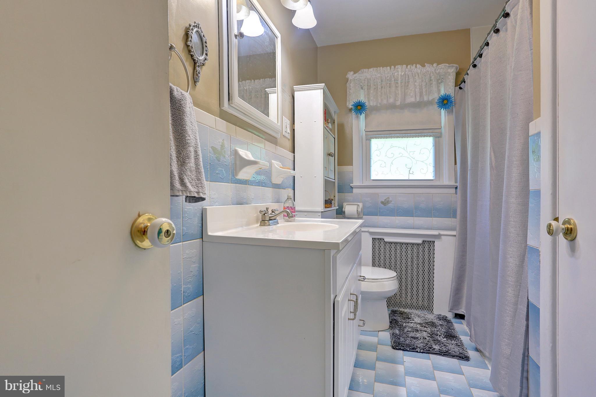 425 Corbin Road York, PA 17403 - Photo 41 of 49 a bathroom with a sink toilet and mirror