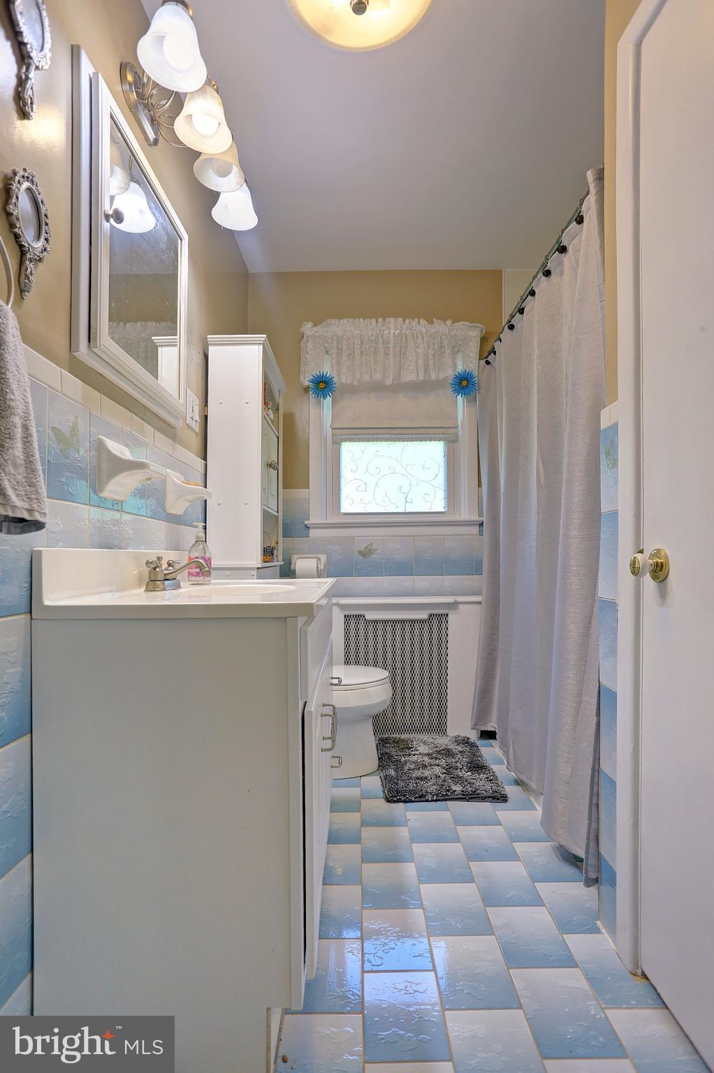 425 Corbin Road York, PA 17403 - Photo 42 of 49 a view of a bathroom with a sink and a mirror