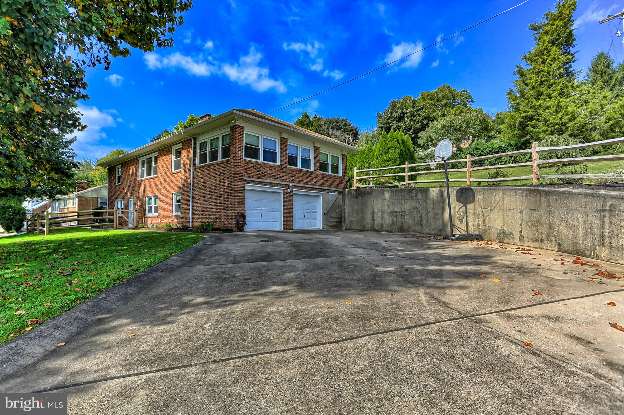 425 Corbin Road York, PA 17403 - Photo 44 of 49 a front view of a house with a lake view