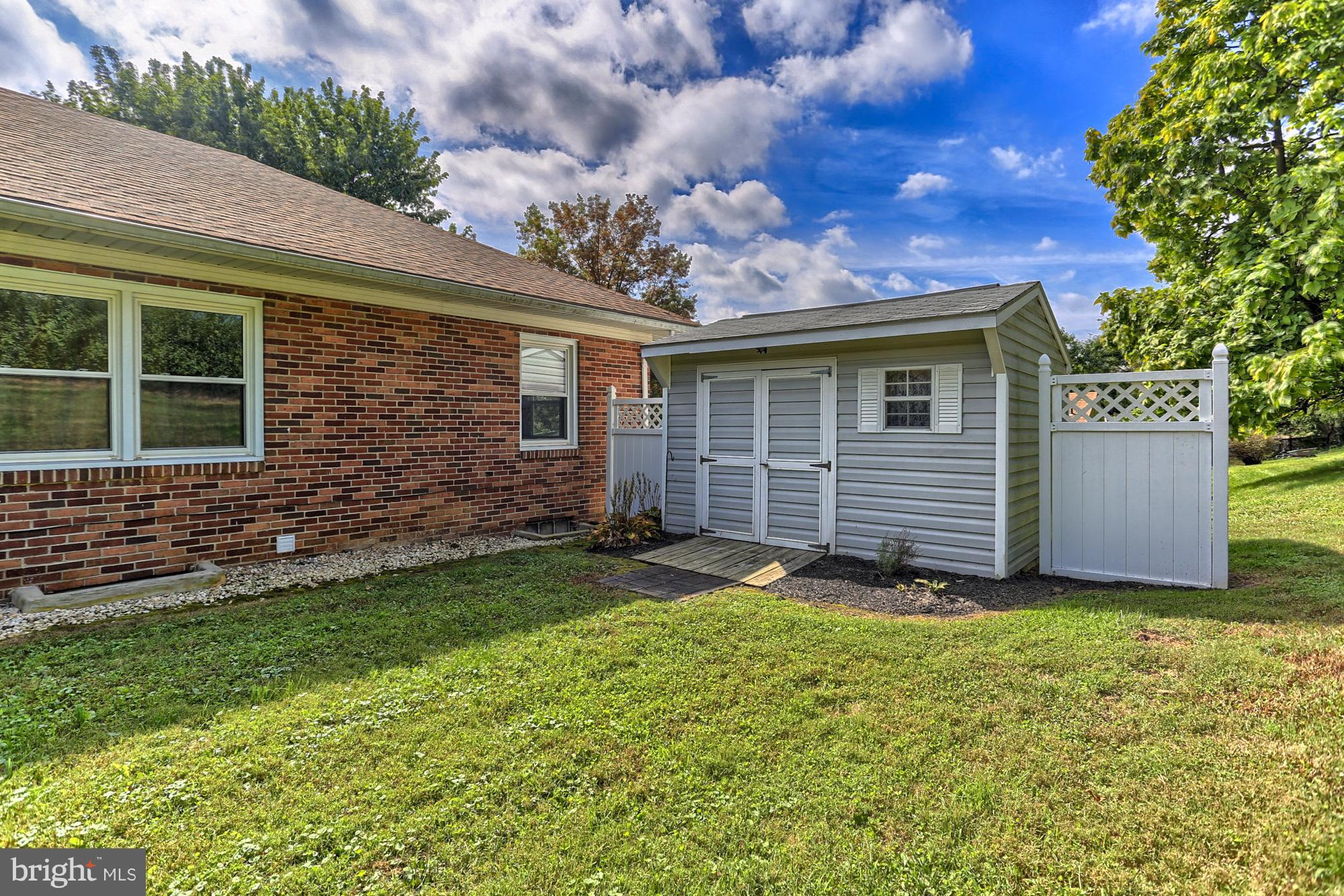 425 Corbin Road York, PA 17403 - Photo 47 of 49 a view of a house with a yard