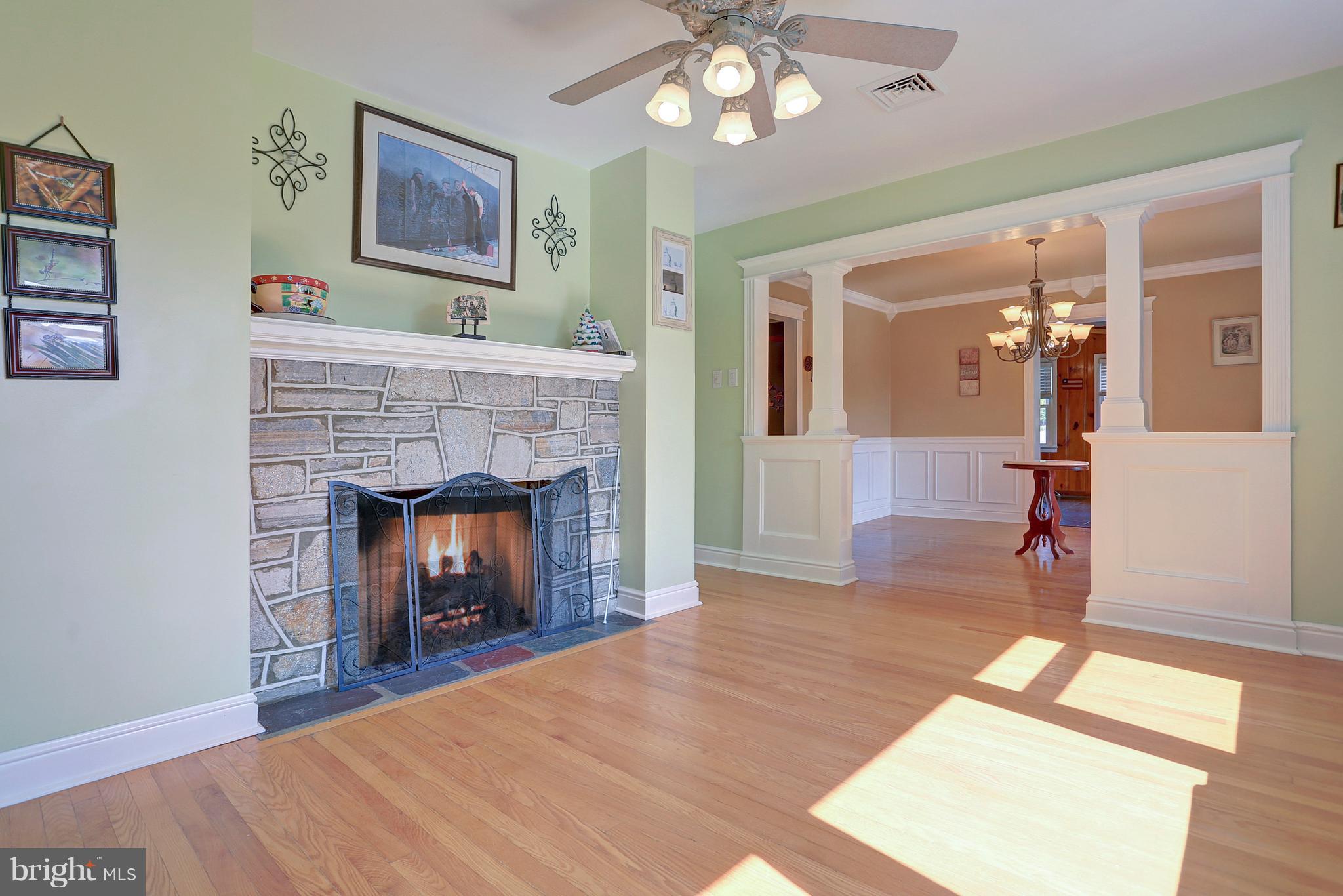 425 Corbin Road York, PA 17403 - Photo 9 of 49 a bedroom with a bed and a fireplace