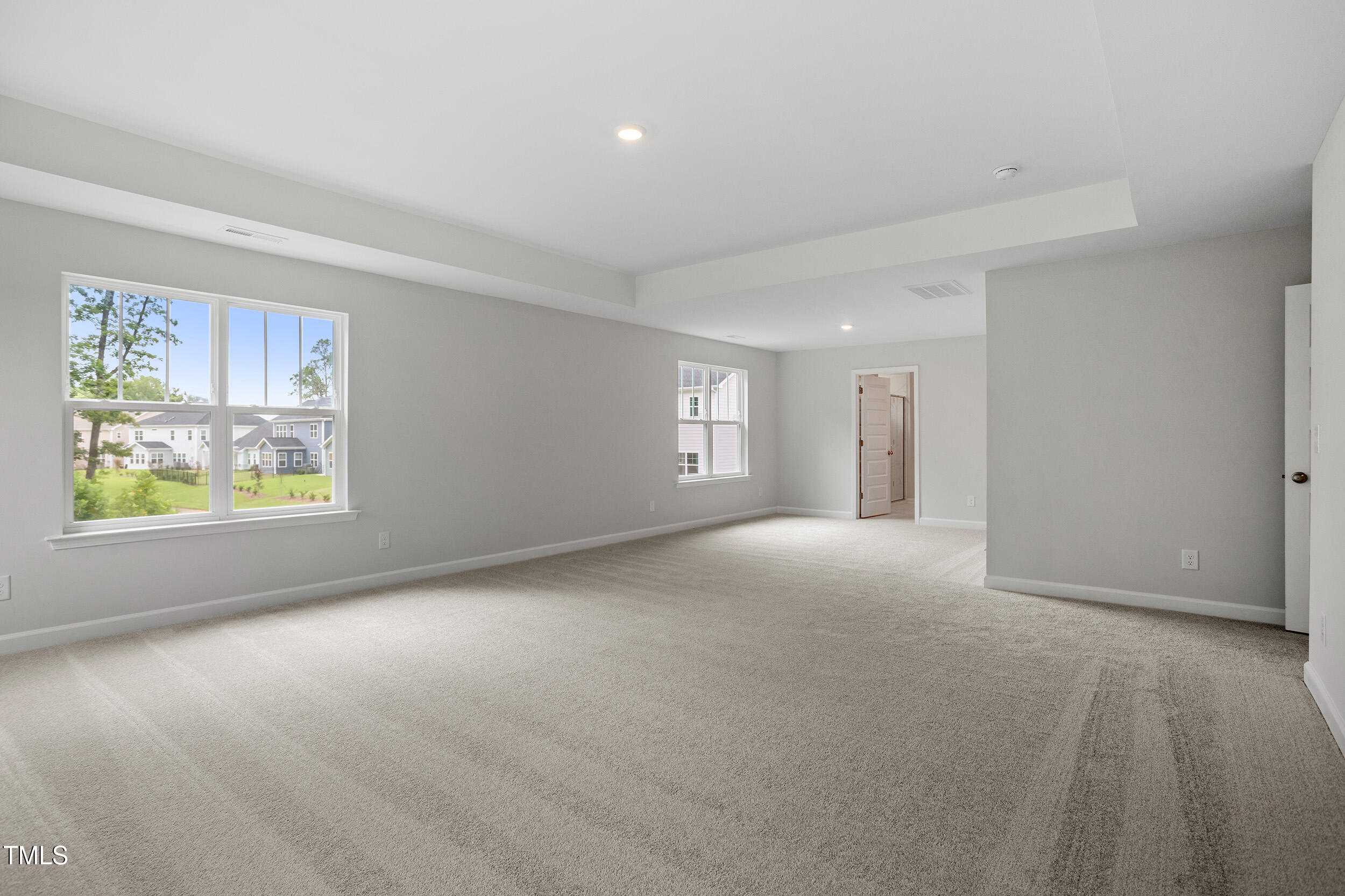 221 Savannah Moss Way, Unit 119 Raleigh, NC 27603 - Photo 25 of 41 a view of empty room with window