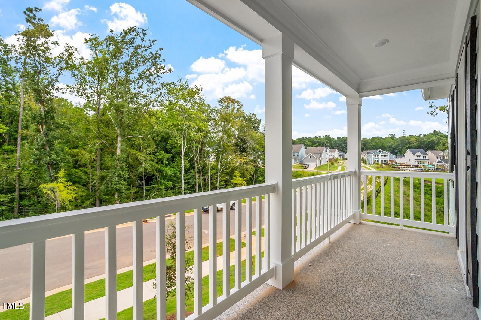 221 Savannah Moss Way, Unit 119 Raleigh, NC 27603 - Photo 31 of 41 a view of a porch with a floor to ceiling window