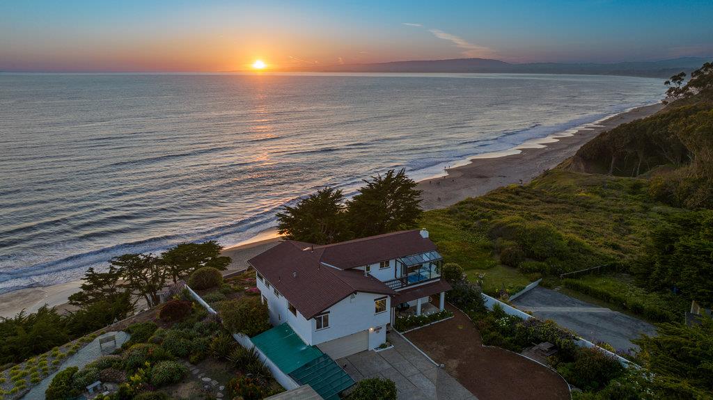 101 Lilly Way La Selva Beach, CA 95076 - Photo 1 of 57 a view of a terrace with lawn chairs and wooden fence