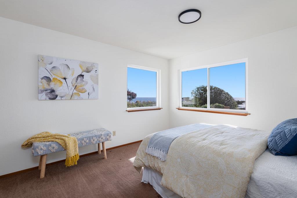 101 Lilly Way La Selva Beach, CA 95076 - Photo 43 of 57 a bedroom with a bed and a window