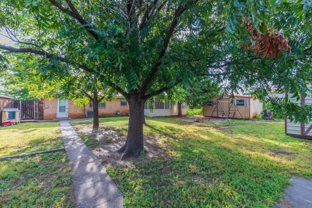 a fire hydrant in the middle of a park