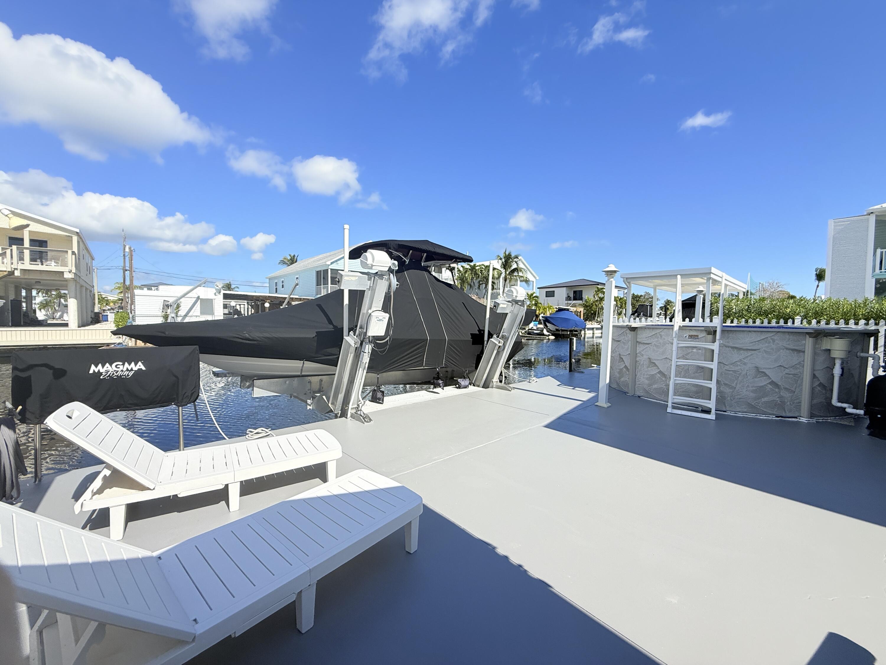 505 Oldsmar Lane Key Largo, FL 33037 - Photo 41 of 58 Dock, Lift, Pool
