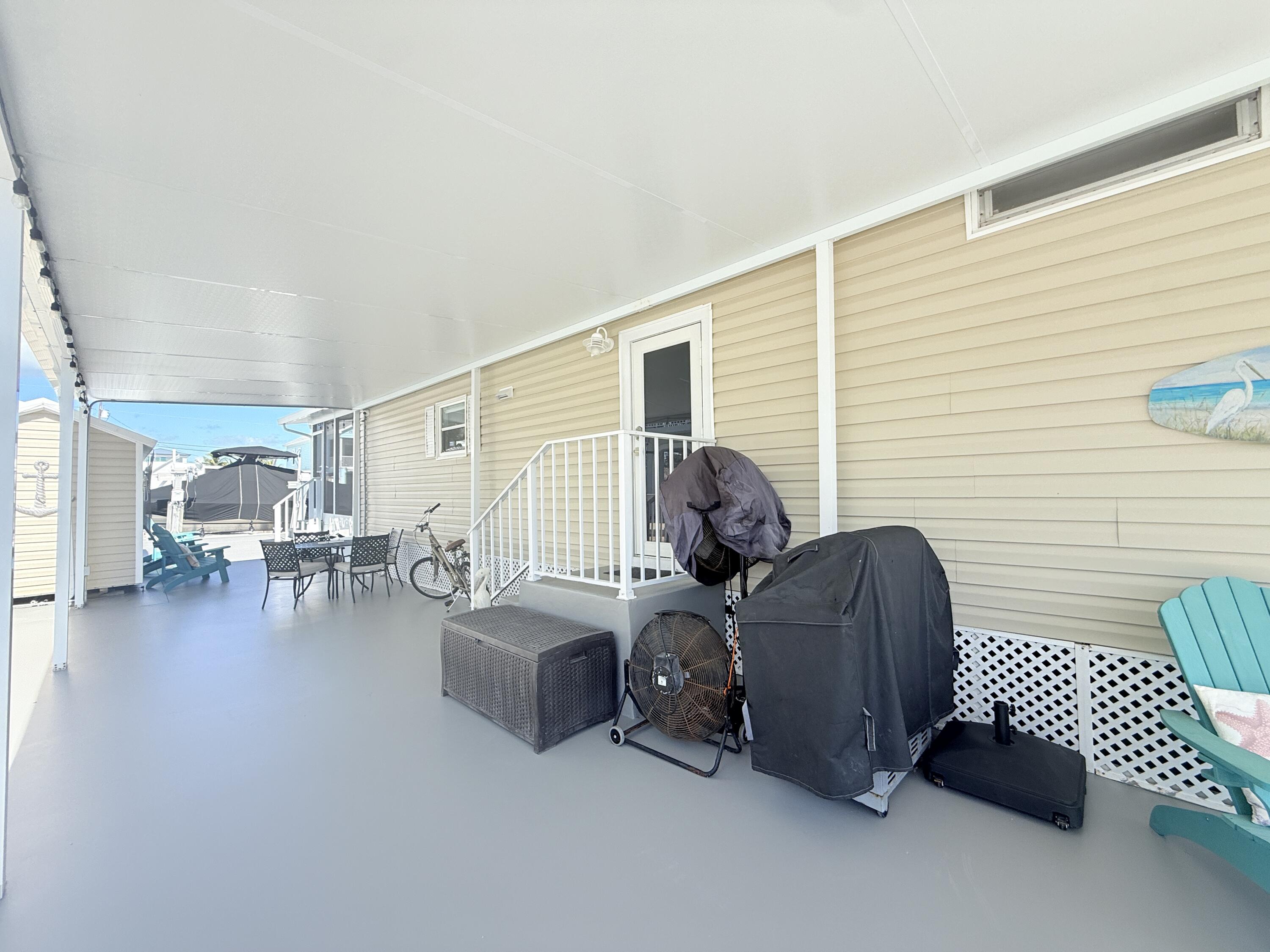 505 Oldsmar Lane Key Largo, FL 33037 - Photo 56 of 58 Carport, or Covered side terrace